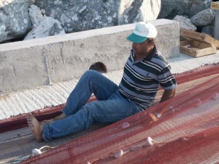 Pcheur prparant ses filets